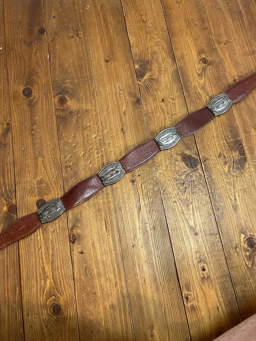 Fossil size medium leather and metal belt